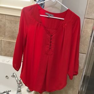 Red silk blouse
